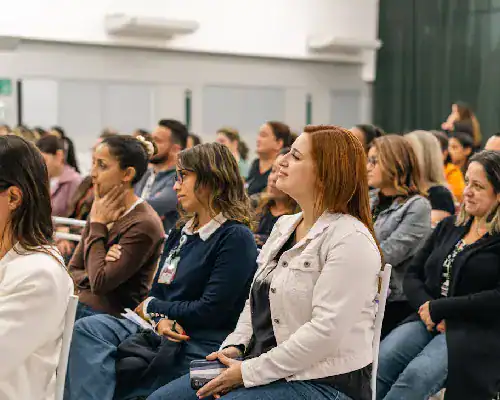 Diverse audience attending a professional seminar or conference.