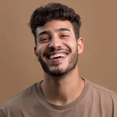 Happy young man smiling, promoting Azure AZ-305 certification training.