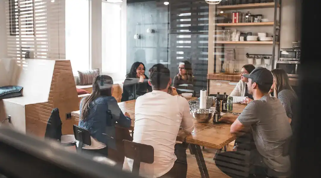 Team discussion on cybersecurity strategies in a modern office setting.