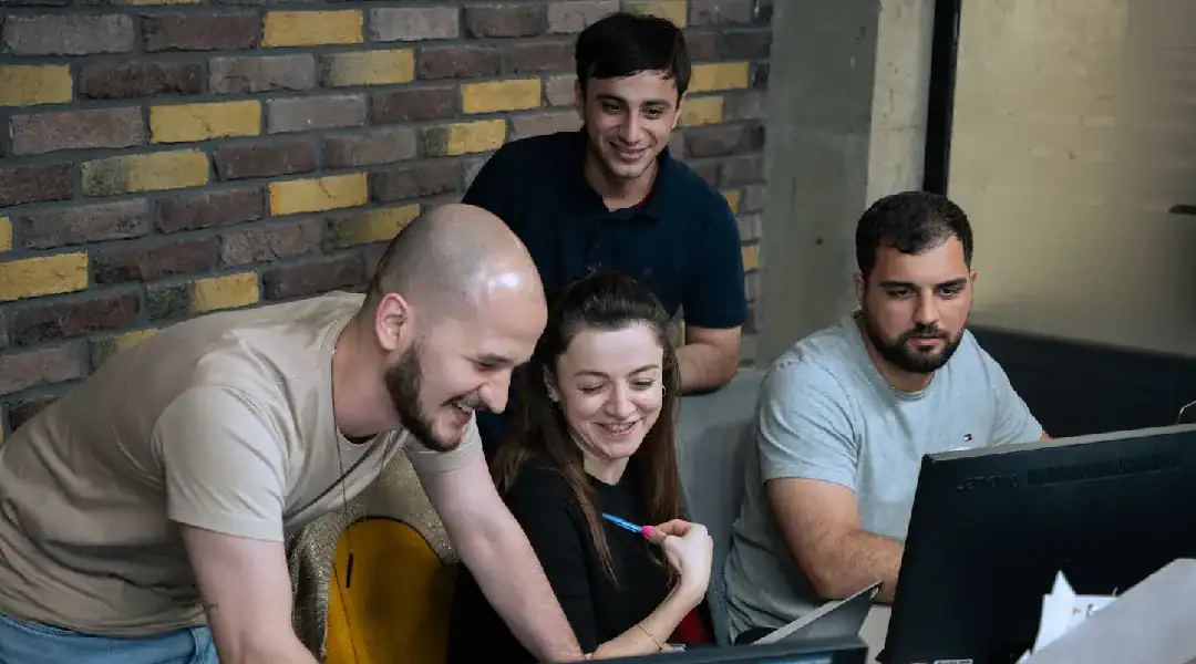 Group of students studying networking certification together.