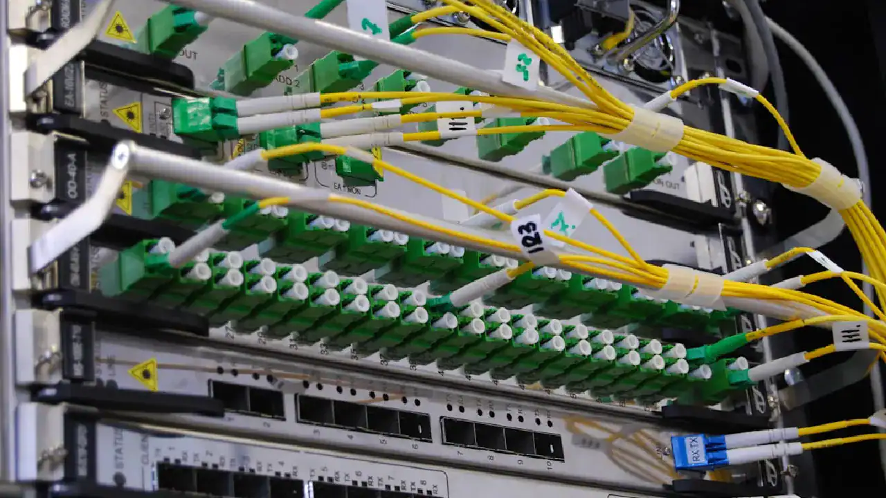 Network cabling with switches and organized wiring setup.