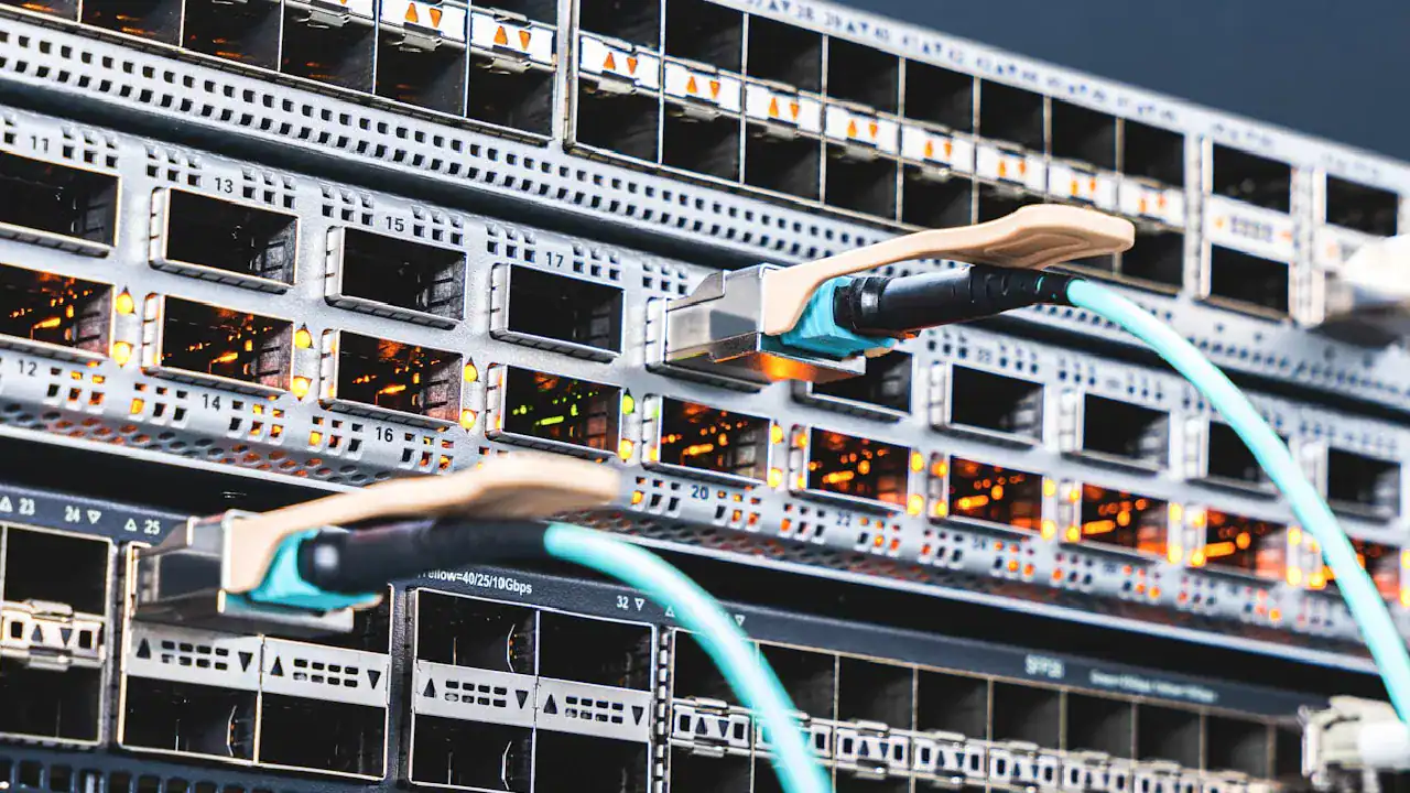 Network server rack with Ethernet cables and switches.