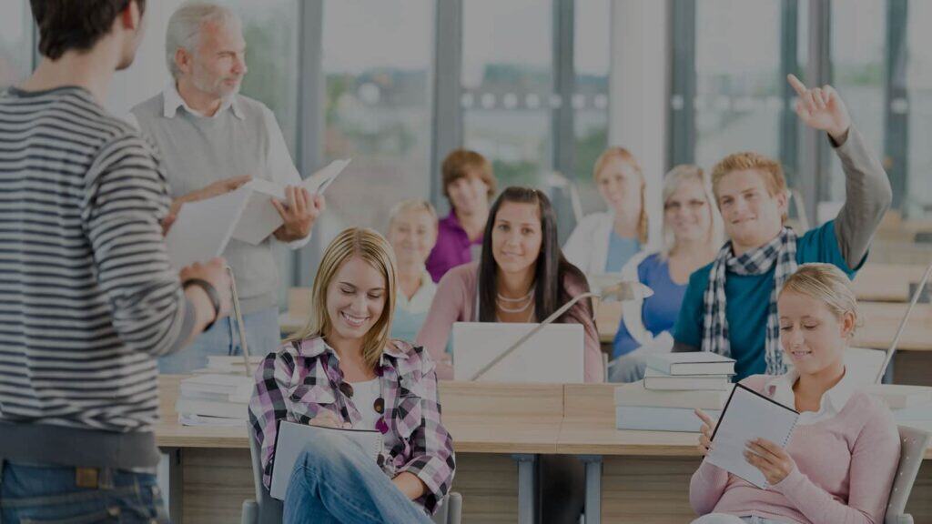 IT certification training session with diverse students and instructor.